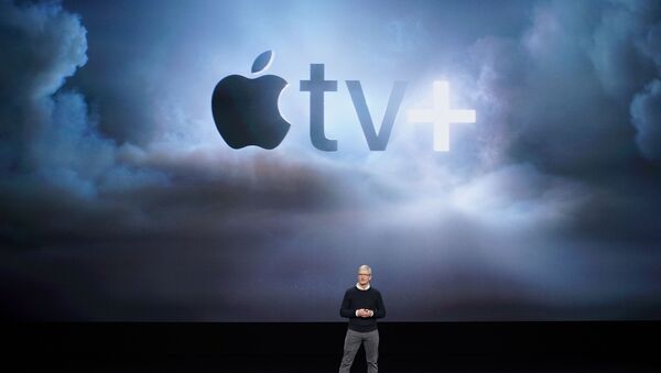 El director general de Apple Tim Cook anuncia nuevos productos durante un evento celebrado en Cupertino - Sputnik Mundo