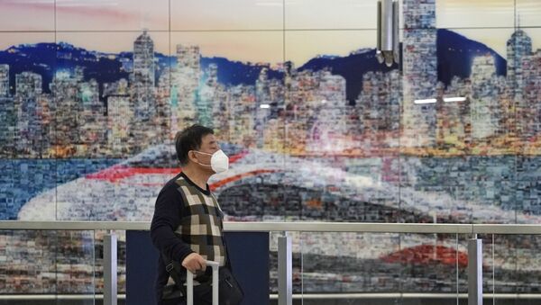 Un turista en Hong Kong - Sputnik Mundo