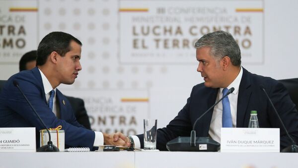 El opositor venezolano, Juan Guaidó, y el presidente de Colombia, Iván Duque - Sputnik Mundo