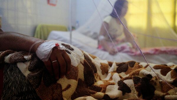 Un paciente con dengue en Asunción - Sputnik Mundo