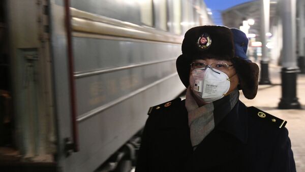 Conductor del tren chino en Rusia - Sputnik Mundo