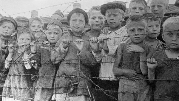 Niños en el campo de concentración de Majdanek, Polonia (imagen referencial) - Sputnik Mundo