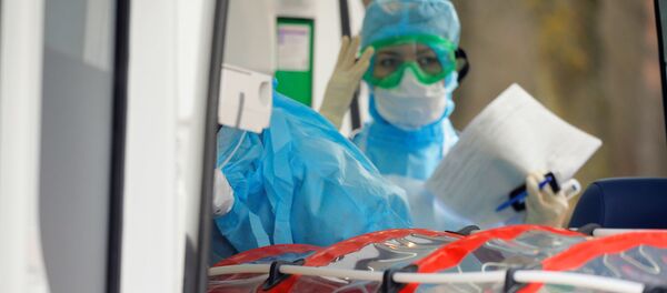 Una enfermera Una enfermera - Sputnik Mundo
