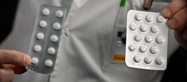 Tabletas con cloroquina Tabletas con cloroquina - Sputnik Mundo