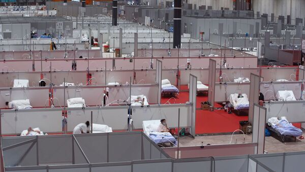 El hospital de campaña de Ifema en Madrid trabaja a pleno rendimiento contra el virus - Sputnik Mundo