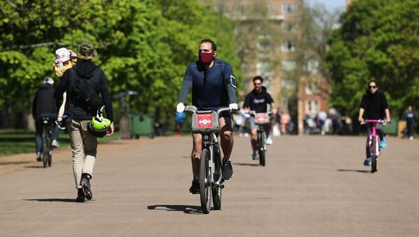 Gente en bicicletas en Londres - Sputnik Mundo