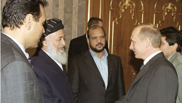 Burhanuddin Rabbani y el presidente ruso, Vladímir Putin, en 2001 - Sputnik Mundo