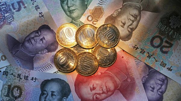 El rublo y el yuan, monedas de Rusia y China - Sputnik Mundo