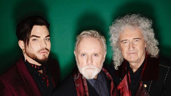 Adam Lambert junto a los integrantes de Queen - Sputnik Mundo