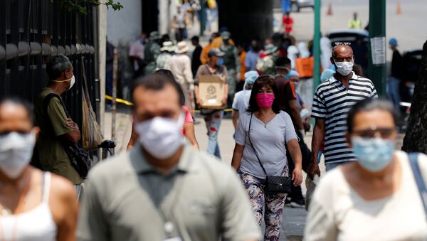 Personas en las calles de Caracas, Venezuela - Sputnik Mundo