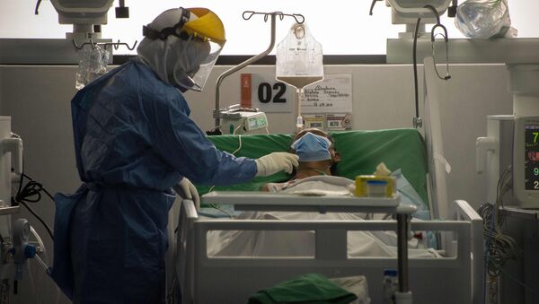 Un paciente con coronavirus en Quito, Ecuador - Sputnik Mundo