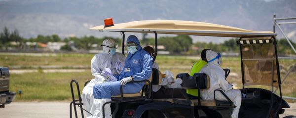 Médicos en Haití durante el brote de coronavirus Médicos en Haití durante el brote de coronavirus - Sputnik Mundo