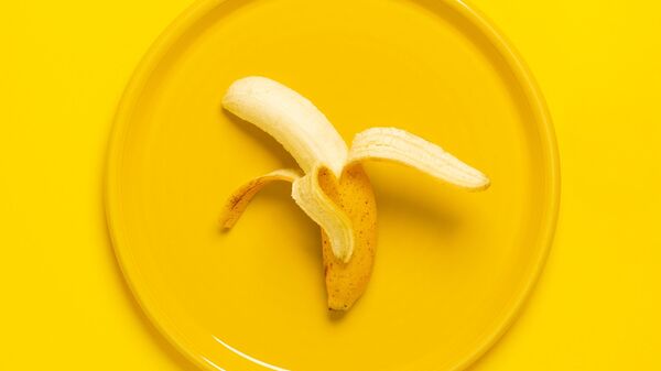 Un plátano, foto referencial - Sputnik Mundo
