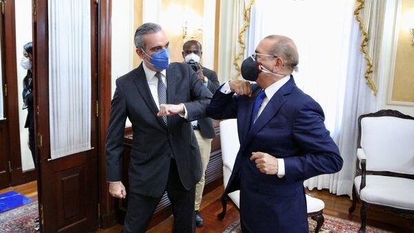 El presidente de República Dominicana, Danilo Medina, y su sucesor, Luis Abinader - Sputnik Mundo