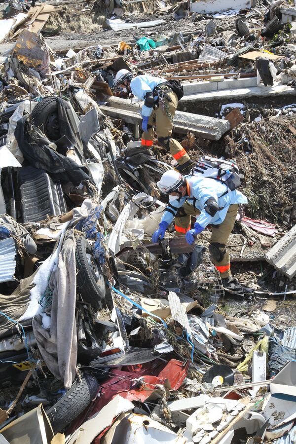 Ascienden a 7.200 muertos por terremoto y tsunami en Japón - Sputnik Mundo