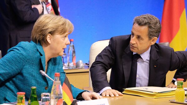 Canciller de Alemania, Angela Merkel, y ex presidente de Francia, Nicolas Sarkozy - Sputnik Mundo