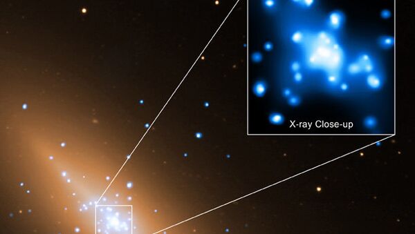 El telescopio espacial Chandra capta nítidas imágenes de gas fluyendo hacia un agujero negro - Sputnik Mundo