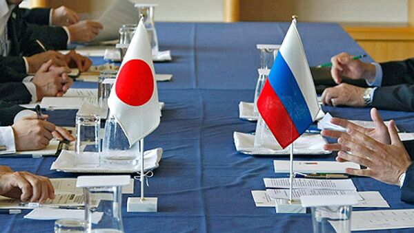 Rusia y Japón abordarán la firma del tratado de paz a finales de enero en Tokio - Sputnik Mundo