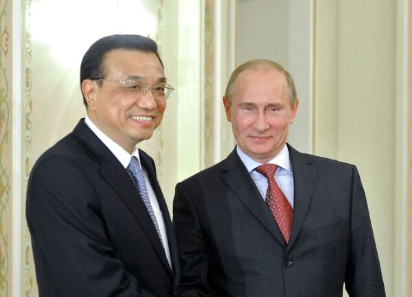Li Keqiang y Vladímir Putin - Sputnik Mundo
