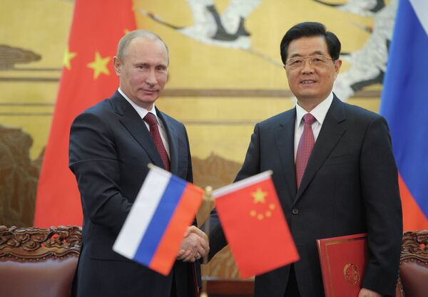 Vladímir Putin y Hu Jintao - Sputnik Mundo