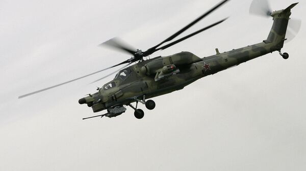 El helicóptero de combate Mi-28N realiza un vuelo de prueba en el aeródromo de la empresa rusa Rostvertol, integrante del consorcio Helicópteros de Rusia - Sputnik Mundo