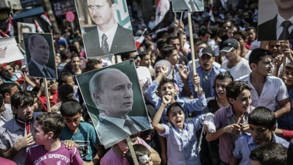 Митинг в поддержку Б. Асада и В. Путина в Сирии - Sputnik Mundo