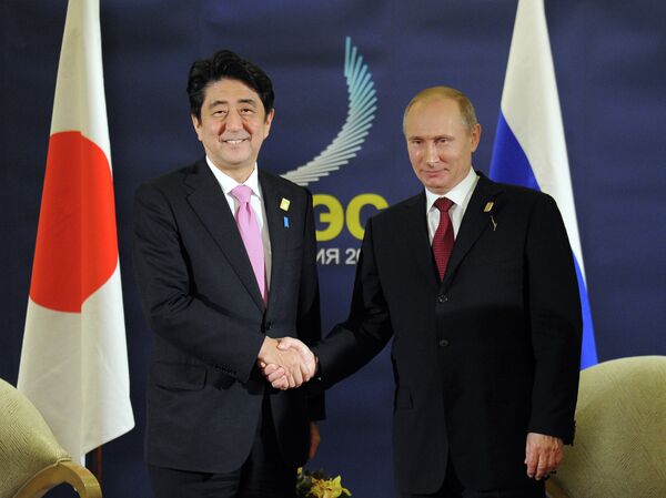 Shinzo Abe y Vladímir Putin - Sputnik Mundo