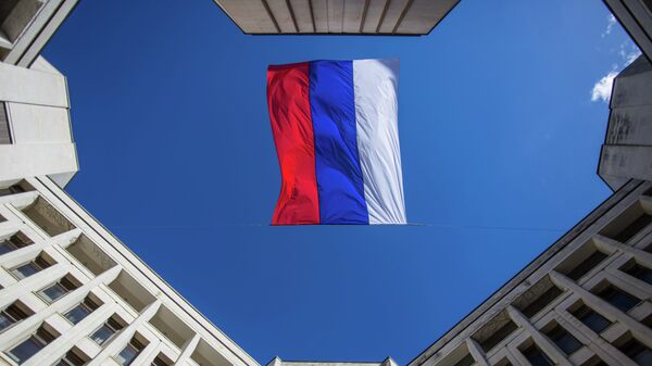 La bandera de Rusia sobre la sede del Consejo Supremo de Crimea - Sputnik Mundo