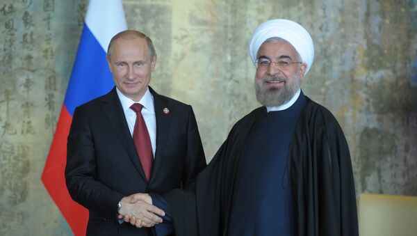 El presidente ruso, Vladímir Putin, y su homólogo iraní, Hasan Rohani - Sputnik Mundo