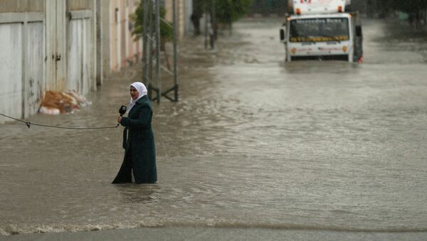 Decretan el estado de emergencia en Gaza por inundaciones - Sputnik Mundo