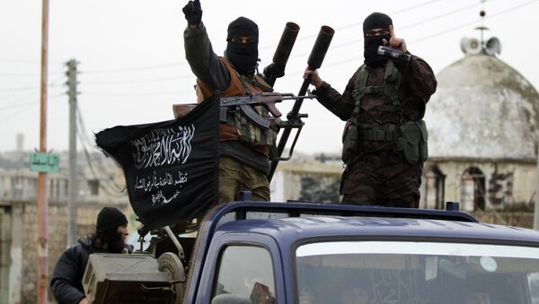 Members of al Qaeda's Nusra Front in the southern countryside of Idlib, December 2, 2014 - Sputnik Mundo